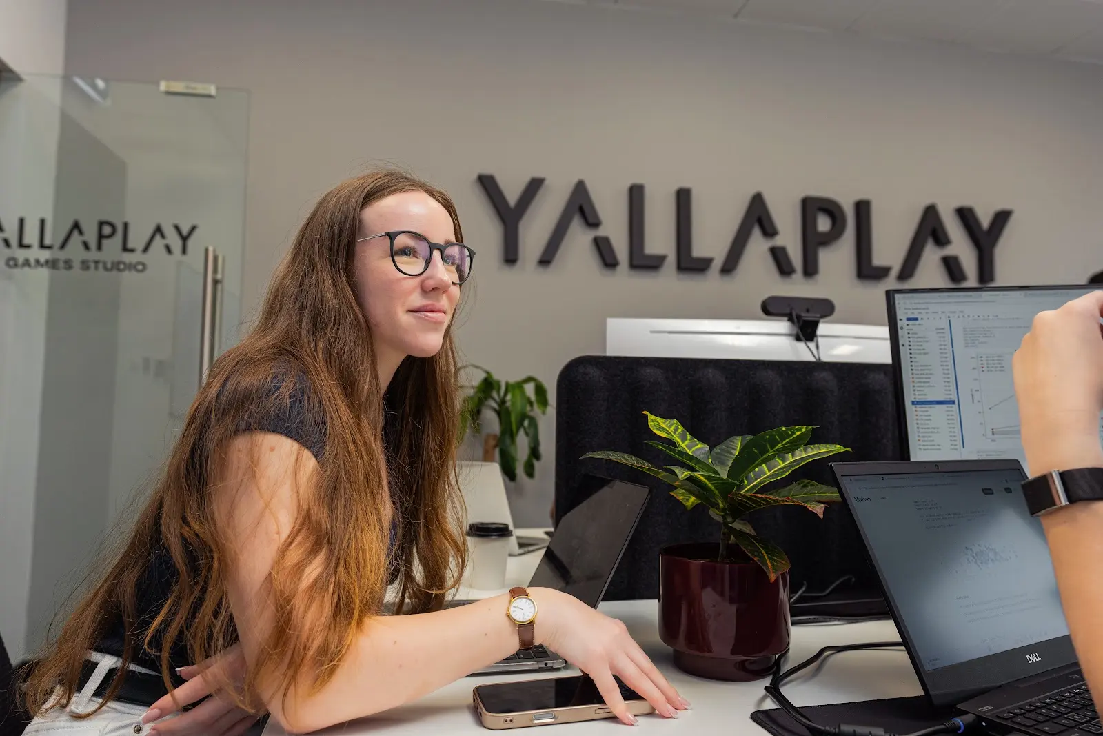 YallaPlay team member at their desk