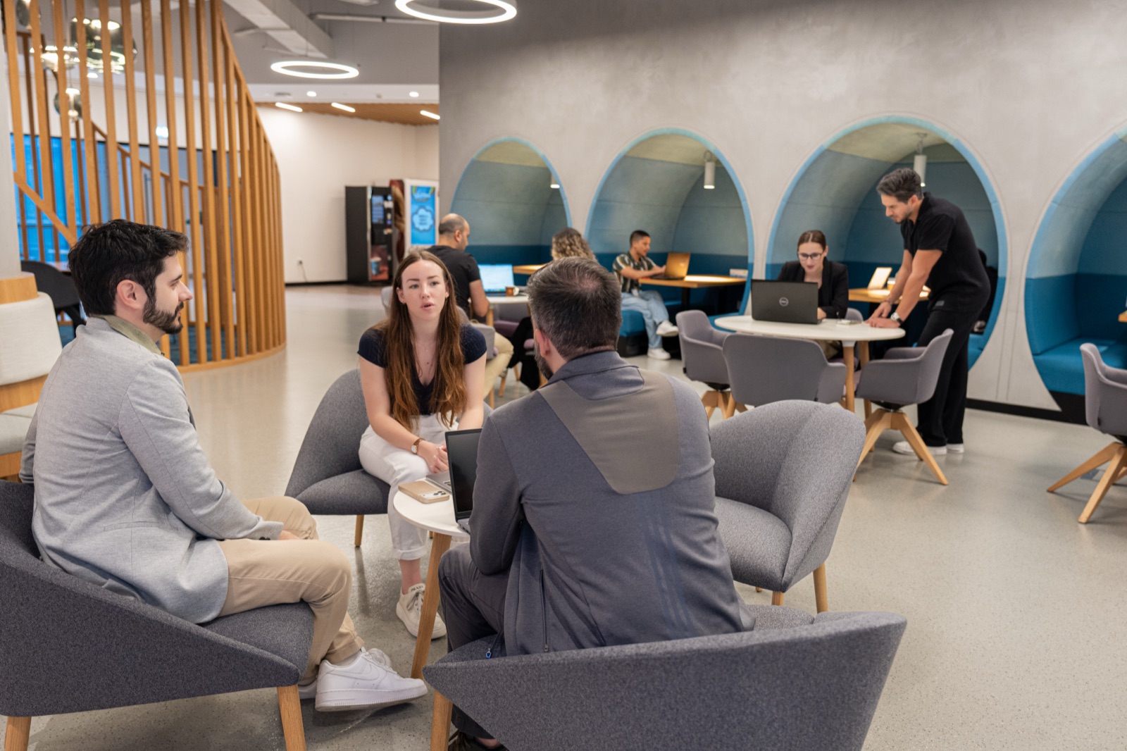 YallaPlay teammates collaborating in the office